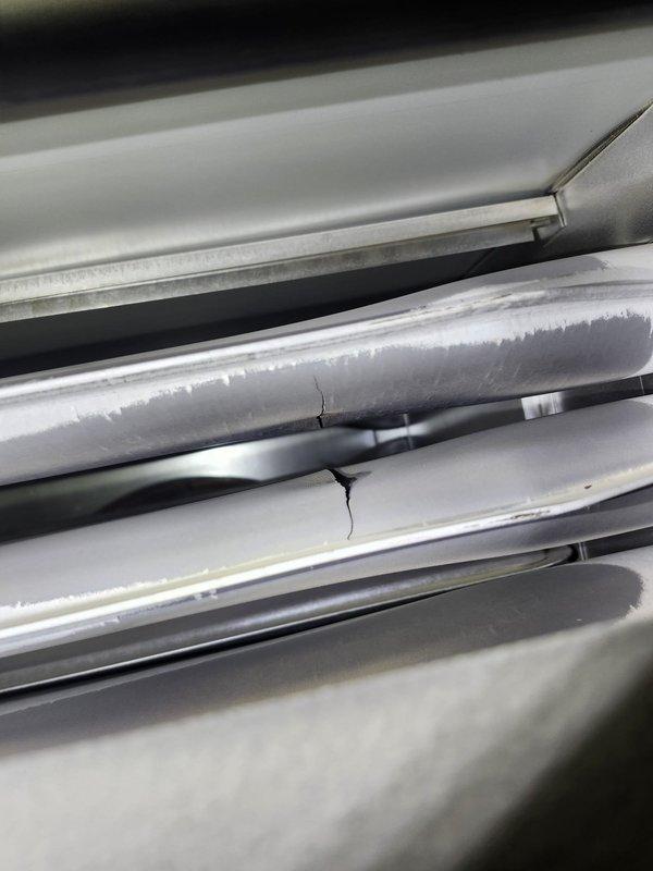 Completed comprehensive equipment assessment of all HVAC units on site. Conducted thorough walkthrough inspection, documented equipment age and condition, photographed refrigerant line sets showing condensation accumulation and insulation status, and identified damaged window track component requiring attention. Provided detailed condition rankings (1-10 scale) for all equipment evaluated.