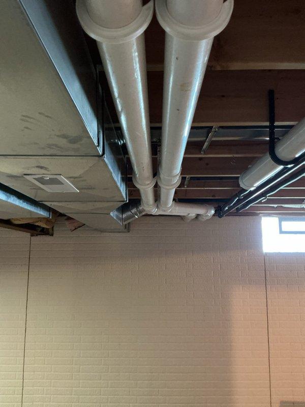 Completed full HVAC system installation including new furnace, air scrubber, whole-home humidifier, and air cleaner. Installed and configured all ductwork connections with proper transitions and elbows to ensure optimal airflow throughout the system. Routed PVC condensate and exhaust piping along ceiling joists, securing all components to structural members per manufacturer specifications. Verified all mechanical connections, tested system operation, and confirmed proper integration of air quality components with primary heating unit.