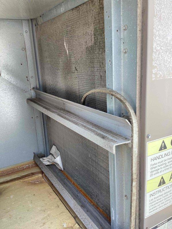 Performed routine preventive maintenance on commercial air conditioning system. Conducted temperature and humidity readings using calibrated digital meter at supply registers, verified proper airflow and system operation. Inspected evaporator coil and filter assembly, noted moderate dust accumulation on heat exchanger surfaces consistent with normal operation. System operating within manufacturer specifications at time of service.