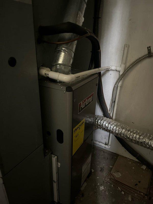 Conducted furnace replacement estimates for duplex property, evaluating existing Airtemp heating units in both utility spaces. Assessed current system conditions, ductwork configurations, and venting arrangements to provide comprehensive replacement recommendations, with additional evaluation for potential air conditioning system upgrades.