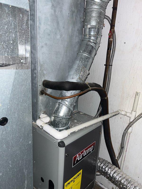 Conducted furnace replacement estimates for duplex property, evaluating existing Airtemp heating units in both utility spaces. Assessed current system conditions, ductwork configurations, and venting arrangements to provide comprehensive replacement recommendations, with additional evaluation for potential air conditioning system upgrades.