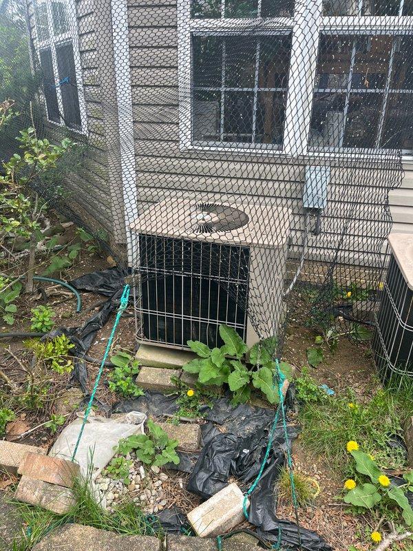 Completed full HVAC system installation for new construction residential property, including outdoor condenser unit with protective wire mesh enclosure and complete indoor air handling equipment with furnace system in basement mechanical room. All equipment installed to manufacturer specifications with proper venting, ductwork connections, and electrical hookups, resulting in fully operational heating and cooling system.