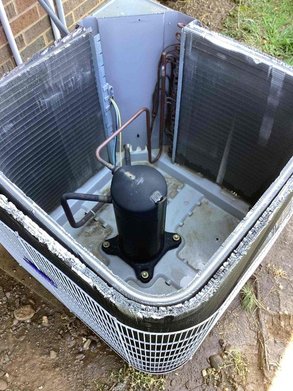 Completed scheduled commercial cooling maintenance visit on outdoor condensing unit. Performed comprehensive system inspection with access panel and top cover removal to evaluate internal components, electrical connections, and coil conditions. Inspected compressor, capacitor, refrigerant lines, and wiring harness for proper operation and wear. Coils showed good condition with clean fins; noted minor dirt accumulation in base pan and copper line oxidation consistent with normal outdoor exposure. All electrical connections secure with proper wire management observed. Unit operating within normal parameters. Documented system condition with photographs for service records.