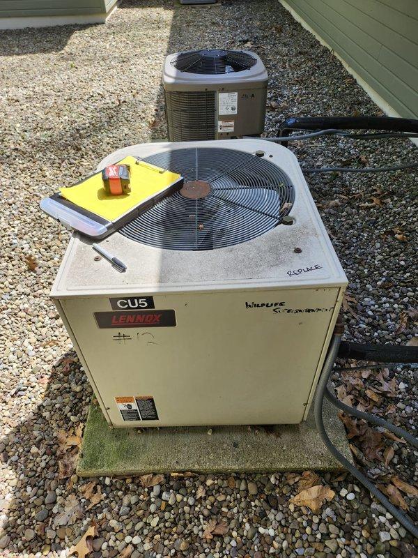 Completed full AC replacement at residential property. Removed existing condensing unit and installed new Lennox CU5 series air conditioning system on concrete pad with proper gravel base. Routed new lineset using flexible conduit along foundation, secured conduit to exterior wall with appropriate mounting hardware and junction boxes. Installed matching evaporator coil, completed all refrigerant connections, performed vacuum and pressure tests, and charged system to manufacturer specifications. Verified proper airflow, temperature differential, and electrical connections. System operational and performing within normal parameters.