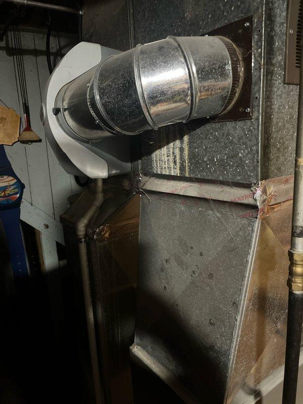 Completed full air conditioning system replacement in residential utility space. Installed new air handler unit and furnace with associated metallic ductwork, ensuring proper connections to existing duct network. System tested and operational upon completion.