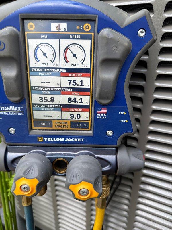 Completed full A/C system and evaporator coil replacement. Installed new condensing unit and matching indoor coil to restore cooling capacity. Charged system with R-454B refrigerant to manufacturer specifications, verifying proper superheat at 75.1°F and subcooling at 9.0°F using calibrated digital manifold gauges. Confirmed all refrigerant pressures, temperatures, and system parameters within acceptable operating ranges for optimal performance and efficiency.