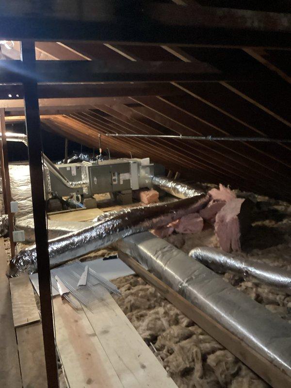 Installed new gas piping from existing supply line to newly installed furnace unit located in attic space. Routed black iron pipe through attic area, secured all connections with proper fittings, and pressure tested system to verify integrity and compliance with local gas code requirements.