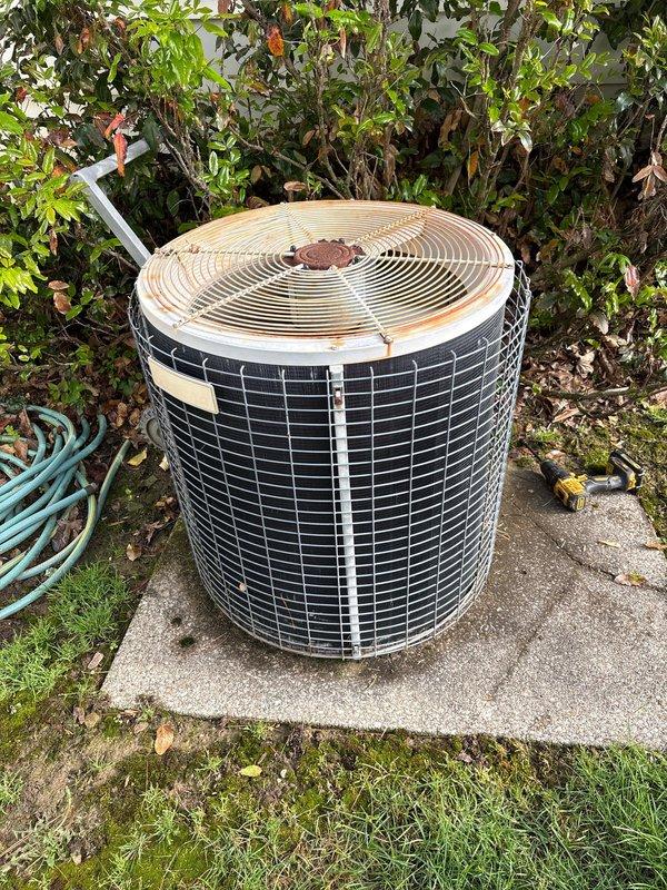Completed routine cooling maintenance visit on residential HVAC system. Performed inspection of outdoor condenser unit, which showed normal weathering consistent with age, and verified proper operation of indoor air handler and humidifier system. All components functioning within normal parameters at time of service.