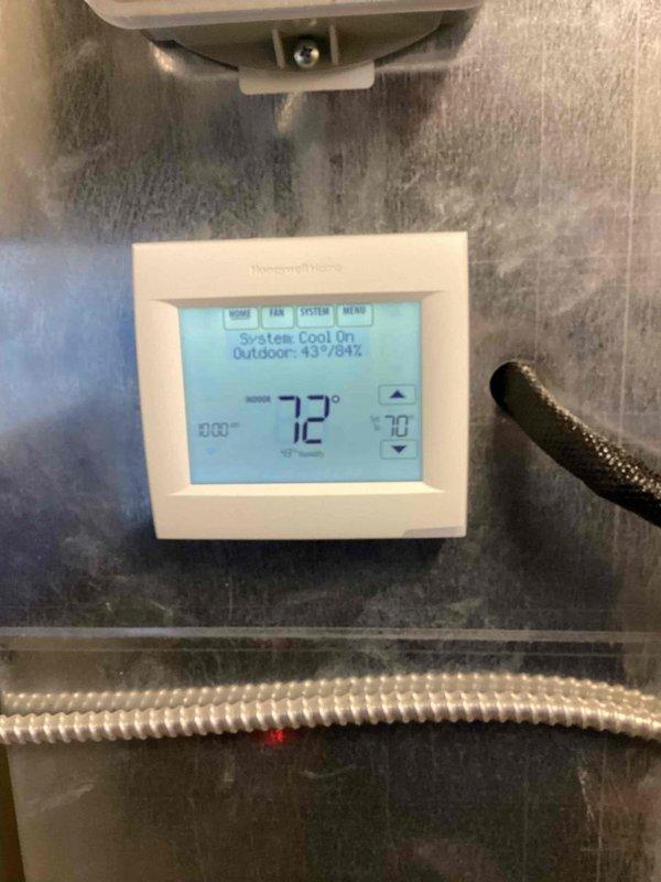 Responded to warranty callback for recently installed commercial thermostat system where one unit was not functioning properly and building occupants had no climate control. Upon arrival, diagnosed thermostat displaying erroneous temperature reading of 869°F with active system alerts. Corrected sensor malfunction, verified proper communication between thermostat and HVAC equipment, and restored full operational control with accurate temperature readings and system functionality.