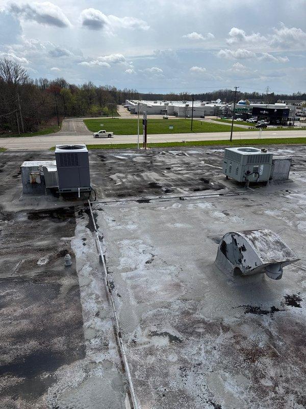 # HVAC New Construction Install - Commercial

Completed installation of multiple rooftop HVAC package units on commercial building flat roof. Installed six to eight rooftop units of varying tonnage, including package units and air handling systems, positioning equipment according to engineered specifications and load-bearing requirements. All units were set on appropriate curb adapters with proper flashing and weatherproofing to prevent water intrusion. Electrical connections, refrigerant lines, and condensate drainage were completed per code requirements. Units were charged, tested, and commissioned to verify proper operation of all heating and cooling functions. System startup procedures confirmed correct airflow, temperature differentials, and control sequences across all installed equipment.