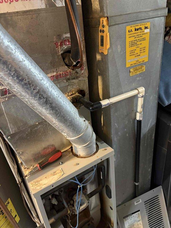 Performed comprehensive air conditioning tune-up service including cleaning and inspection of indoor furnace unit and outdoor condenser. Verified proper operation of all system components, checked electrical connections at control panel, inspected refrigerant lines and condensate drain piping, and confirmed adequate airflow through ductwork and exterior unit fan assembly.