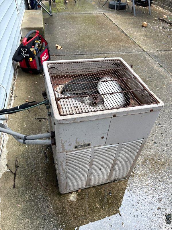 Completed routine maintenance and inspection on residential air conditioning system. Performed thorough cleaning of outdoor condenser unit, including coil cleaning, debris removal from protective grille, and exterior panel cleaning to remove accumulated dirt and oxidation. Verified proper operation of all components and contacted customer upon completion as requested.