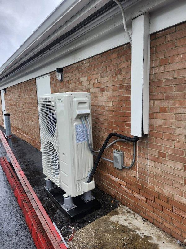 Responded to commercial HVAC callback to address refrigerant leaks at flare connections on outdoor condensing unit. Upon arrival, inspected brass service valves and copper refrigerant line connections where leaks were previously identified. Repaired faulty flare connections, pressure tested system to verify leak elimination, and confirmed proper refrigerant charge levels. Unit returned to normal operation with all connections secure and system operating within manufacturer specifications.