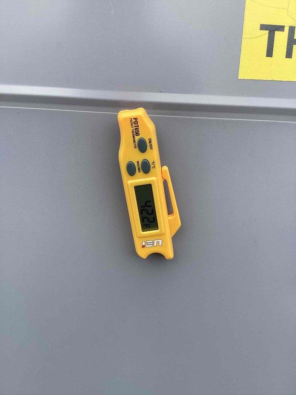 Performed routine commercial cooling maintenance on rooftop HVAC unit. Inspected and documented three KOCH pleated air filters installed in filter rack, all showing proper installation and condition. Recorded temperature measurements using digital instrument, with reading of 92.1°F indicating normal operating parameters for system performance during visit.