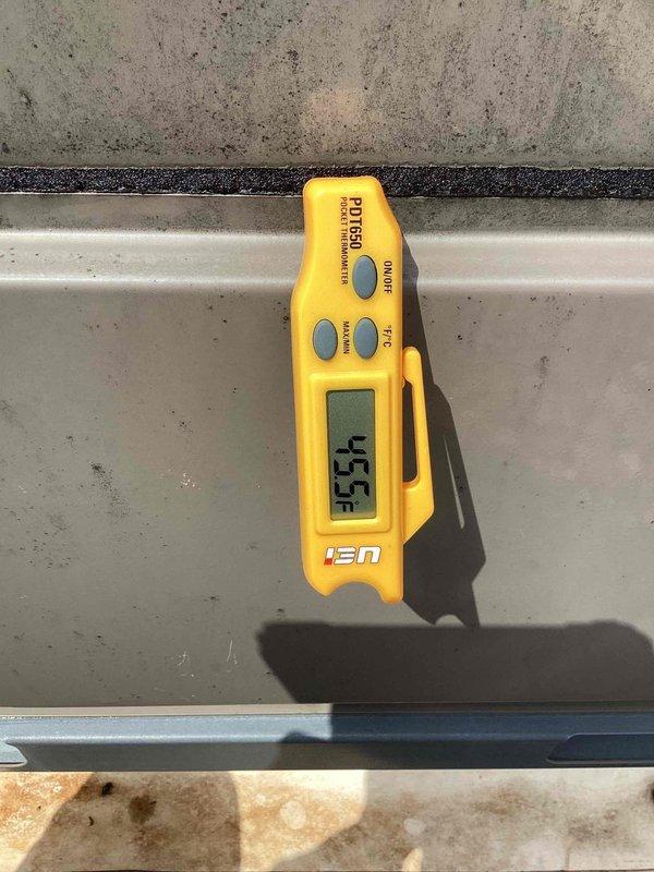 Completed scheduled commercial cooling system maintenance inspection. Verified supply air temperature at 45.5°F using calibrated digital thermometer, confirming proper cooling performance. Inspected damper actuator assembly, motor mechanism, and associated control wiring for proper operation and secure mounting.
