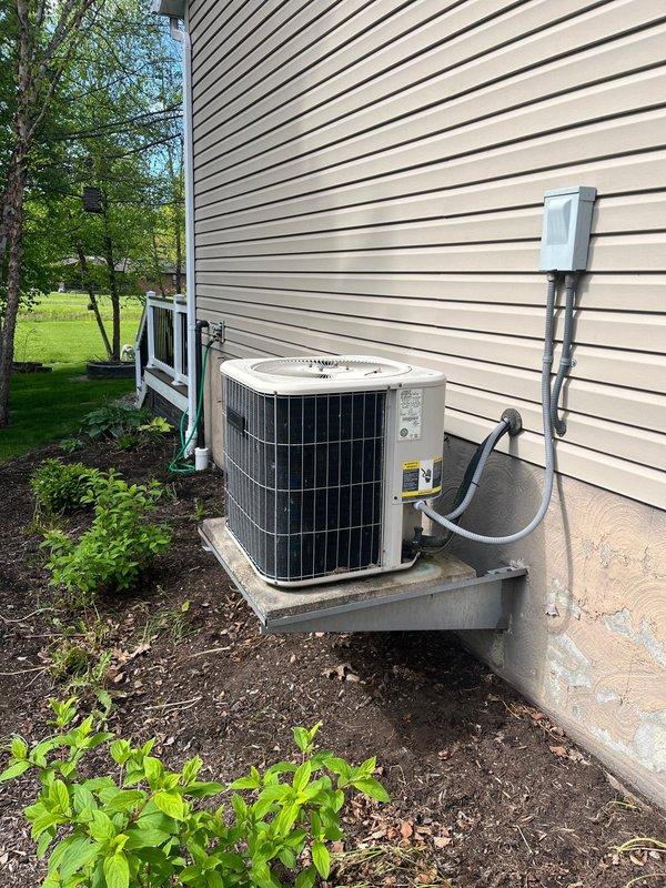 Completed full HVAC system retrofit including replacement of gas furnace and air conditioning condenser unit. Installed new Lennox furnace with updated ductwork connections and venting system, along with new outdoor AC condenser positioned on concrete pad with proper refrigerant line routing and electrical disconnect. All components tested and operational upon completion.