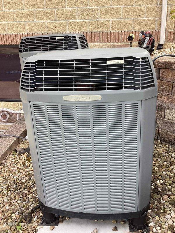 Performed complete preventive maintenance on Trane air conditioning system, including thorough cleaning and operational inspection of outdoor condenser unit. Inspected and verified proper installation of air filter with clean pleated media in filter housing, confirming adequate airflow for system efficiency. All components found operating within normal parameters with unit maintaining proper cooling function.