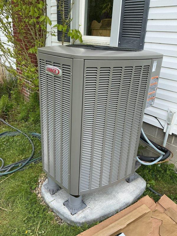 Replaced complete heat pump system with new Lennox EL16KP1-018-230A02 unit manufactured 07/2025. Unit installed on concrete pad adjacent to residential structure, utilizing R-454B refrigerant with 5 lbs 0 oz charge. System operates at 208/230V, single phase, 60 Hz with 7.2 FLA compressor and 0.7 HP fan motor. Completed all electrical connections, refrigerant line routing along exterior wall, and performed full startup procedures per manufacturer specifications. All warning labels and AHRI certification documentation properly affixed to unit exterior panel. System tested and operational.