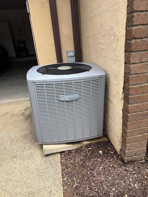 Responded to service call for air quality equipment maintenance. Successfully replaced UV air scrubber bulb in the HVAC system to restore proper air purification functionality. Inspected outdoor condenser unit and verified proper operation of all cooling system components.