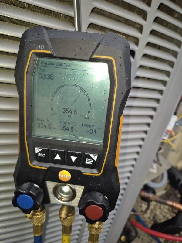 Responded to warranty callback for no cooling complaint. Performed pressure leak test on refrigerant system, which held at 354.8 psi with minimal delta pressure variation, confirming system integrity and resolving the issue.