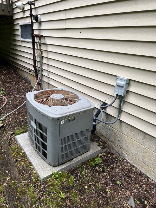 Performed on-site evaluation of aging residential air conditioning system showing significant wear and operational concerns. After assessment determined that repair costs would exceed replacement value, provided comprehensive estimate for complete AC system replacement. Documented existing equipment condition including weathered condenser units, electrical connections, and refrigerant line configurations to facilitate accurate replacement specifications and ensure proper system sizing for the residence.
