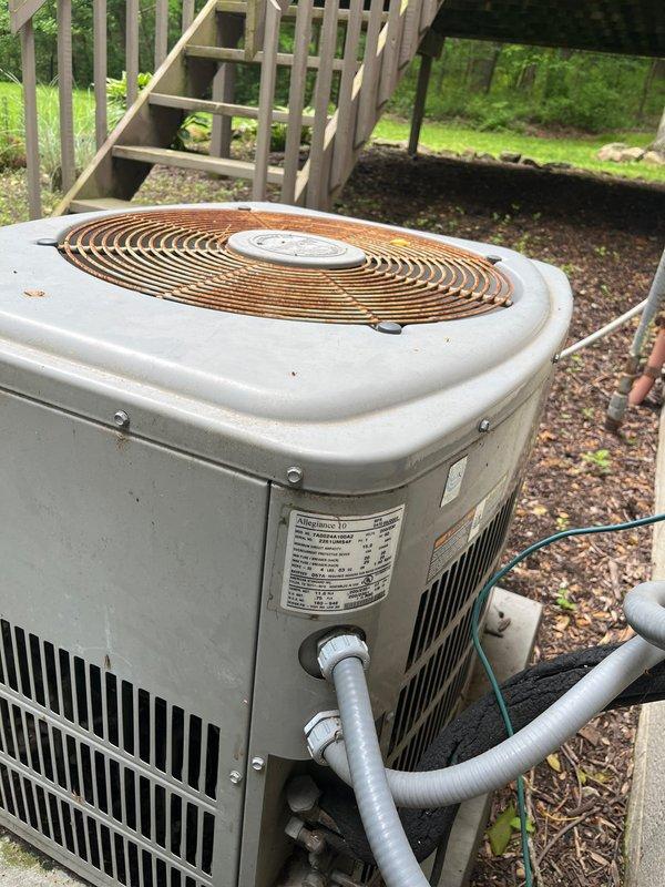 Performed on-site evaluation of aging residential air conditioning system showing significant wear and operational concerns. After assessment determined that repair costs would exceed replacement value, provided comprehensive estimate for complete AC system replacement. Documented existing equipment condition including weathered condenser units, electrical connections, and refrigerant line configurations to facilitate accurate replacement specifications and ensure proper system sizing for the residence.