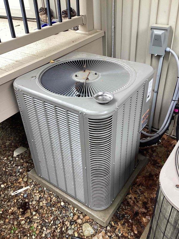 Completed spring maintenance on commercial outdoor air conditioning condenser unit. Performed comprehensive inspection of electrical components within control panel, including MARS capacitor and wiring connections at terminal block. Cleaned and evaluated exterior condenser unit with fan assembly and housing. All components inspected for proper operation and seasonal readiness.