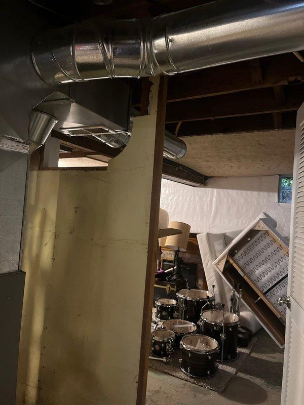Completed full HVAC system replacement in residential basement mechanical room. Removed existing heating and cooling equipment and installed new furnace and air conditioning system with corresponding ductwork modifications. All new metallic ductwork properly sealed and connected to ensure optimal airflow throughout the home, with PVC condensate drainage lines installed per manufacturer specifications and local code requirements.