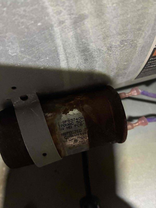 Completed preventative maintenance inspection on 20-year-old air conditioning system with 2-4 window configuration under maintenance agreement. Inspected ductwork system in attic space, verifying proper connections at plenum transitions and ensuring all flexible and rigid duct sections remain secure and sealed. Examined electrical components including capacitor, noting age-related surface corrosion on housing while verifying proper electrical specifications and functionality for continued operation.
