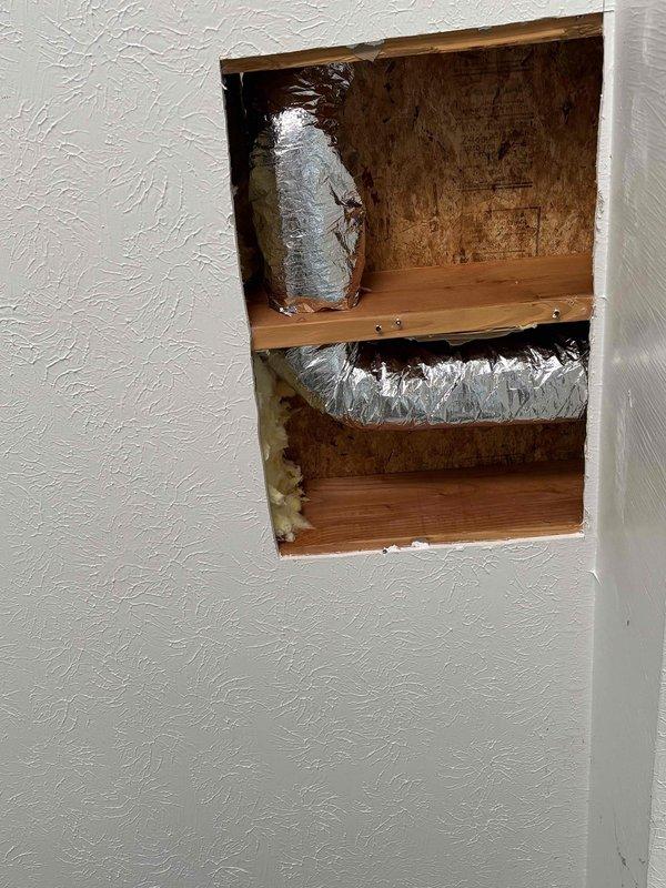 Completed HVAC rough-in finish work by installing flexible ductwork to route three exhaust fans to exterior soffit terminations. Ran insulated flex duct through wall and ceiling cavities, securing connections at fan locations and terminating at soffit-mounted exhaust caps to ensure proper ventilation and code compliance.