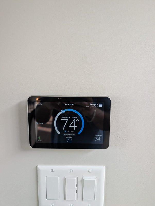 Responded to emergency service call for smart thermostat displaying error code 434 with "Service Urgent" message in dining room. Diagnosed and cleared thermostat fault, verified proper communication between thermostat and HVAC system, and confirmed cooling system operational with unit cycling normally to setpoint of 72 degrees.