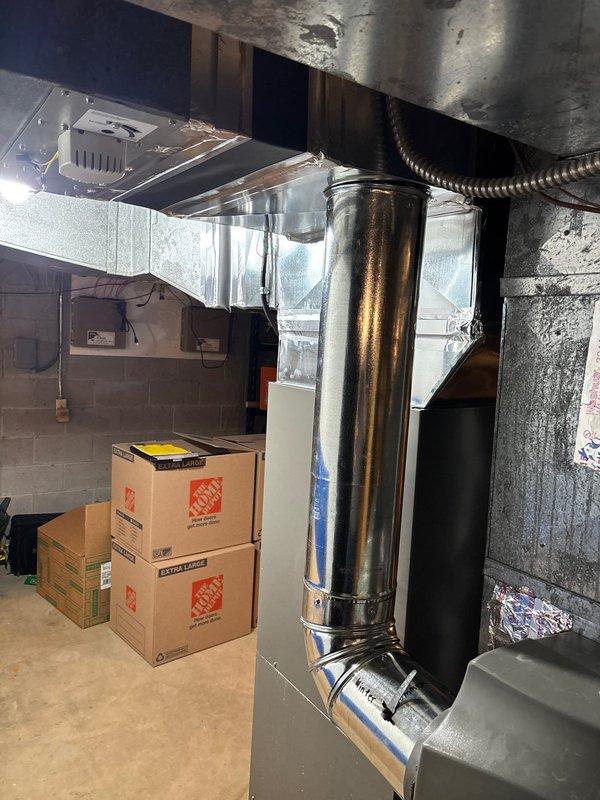 # HVAC Install - A/C & Coil

Completed full air conditioning system replacement including new condenser unit and evaporator coil installation. Removed existing equipment and installed new A/C system with proper refrigerant line connections, condensate drainage integration with existing PVC piping system, and electrical connections. Installed new evaporator coil in the air handler with proper ductwork connections to existing supply and return plenum. Verified all connections were secure, tested system operation, and confirmed proper airflow through the ductwork. System is fully operational and cooling efficiently.