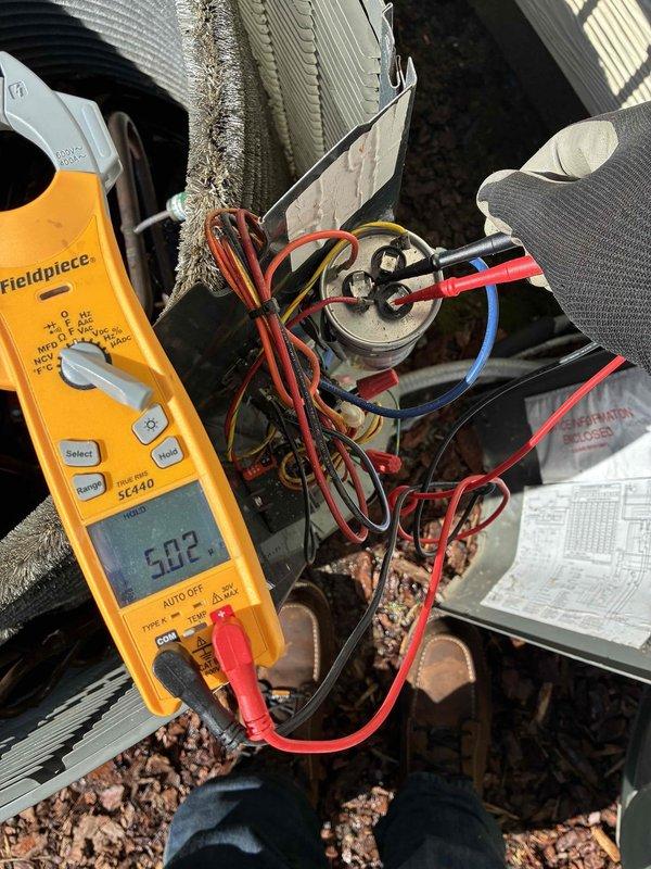 Performed comprehensive clean and check maintenance service on outdoor HVAC unit under preventative maintenance agreement. Conducted electrical diagnostics using digital multimeter, verifying capacitor functionality and electrical component integrity with readings within normal operating parameters. Completed full system inspection of outdoor unit including all electrical connections, wiring terminals, and component operation to ensure optimal performance and reliability.
