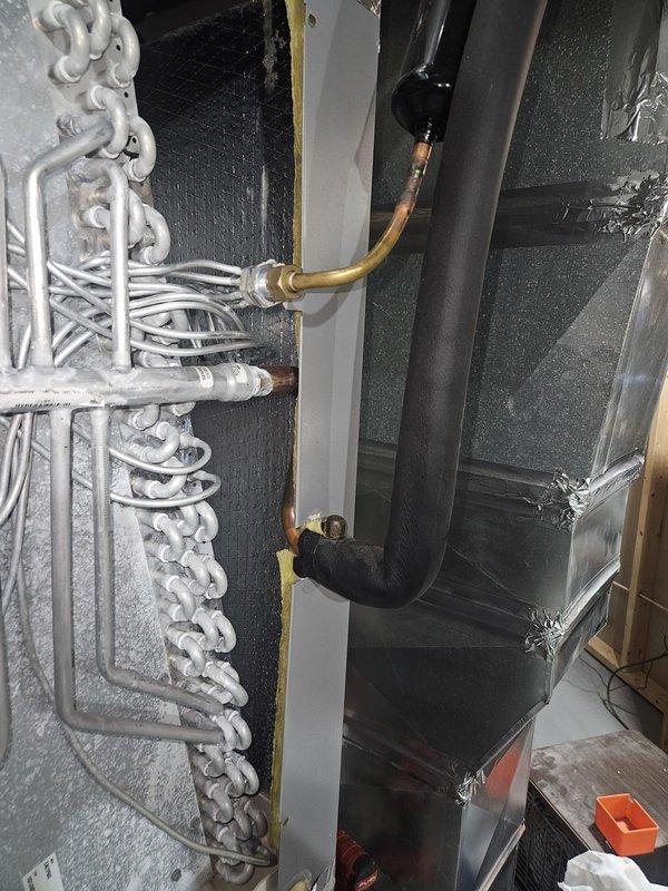 Responded to no-cooling call on 5-year-old AC system. Upon arrival, confirmed unit would not power on. Performed diagnostic inspection of air handler and evaporator coil assembly. Identified tripped breaker at electrical panel as root cause. Reset breaker and verified proper voltage supply to unit. Tested system operation through complete cooling cycle. Confirmed evaporator coil condition, refrigerant line connections, and condensate drain functionality. Unit restored to normal operation with proper airflow and cooling output.