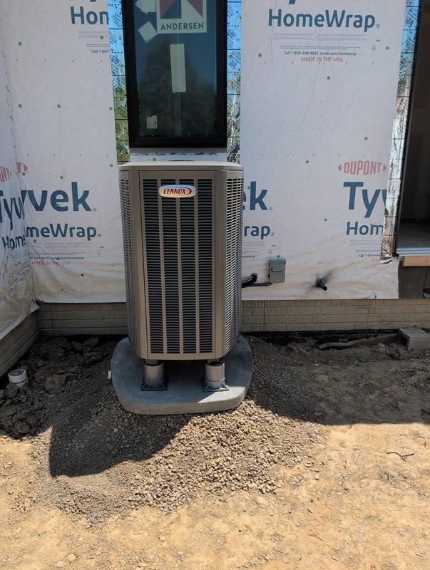 Completed new construction HVAC installation including Lennox heat pump system with outdoor condensing unit mounted on concrete pad and indoor equipment stack consisting of furnace and air handler installed in basement utility area. Wired and installed zone control panel, converted furnace to LP operation using kit provided at job site, and connected all necessary condensate drain lines and PVC venting to ensure proper system operation.