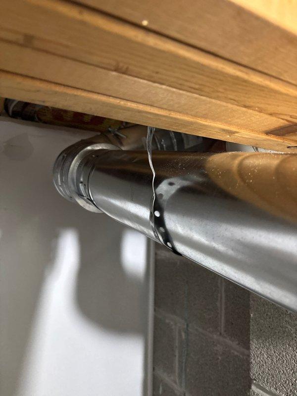 Responded to service call for water heater venting issue in basement utility room. Upon inspection, identified improper venting configuration that required correction to meet code compliance and ensure safe operation. Reconfigured venting system using appropriate materials and connections, ensuring proper draft and exhaust flow from water heater. Verified all pipe connections were secure, tested system operation, and confirmed venting was functioning correctly with no obstructions or leaks. Unit tested and left in proper working condition.