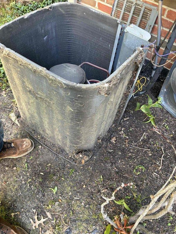 Completed routine cooling maintenance on a 5-year-old air conditioning system. Performed standard tune-up procedures including inspection of outdoor condensing unit, which showed significant exterior casing damage with exposed internal components and biological growth on housing. All maintenance tasks were completed as scheduled.