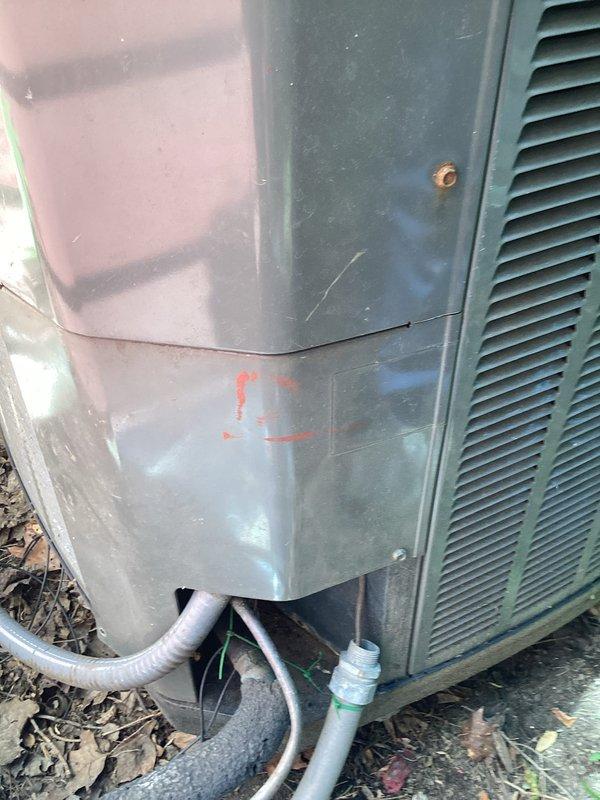 Responded to service callback for outdoor condensing unit with missing access panel. Upon arrival, found lower access panel had been inadvertently left off following recent preventive maintenance visit. Reinstalled and secured panel with appropriate fasteners to restore unit to proper operating condition. Unit exterior and refrigerant line penetrations confirmed intact with no additional service required.