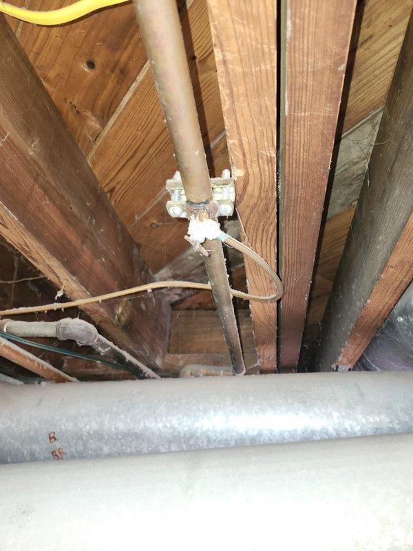 Completed air conditioning retrofit installation including new A/C unit and evaporator coil. Installed new condensing unit, integrated evaporator coil with existing furnace system, and ran new refrigerant lines through attic space utilizing proper insulation and securing methods. Connected new PVC condensate drain line through ceiling joists to ensure proper drainage, installed condensate pump at indoor unit location, and verified all electrical connections to furnace and water heater met code requirements. Tested system operation, confirmed proper refrigerant charge, and verified airflow at all registers to ensure optimal cooling performance.