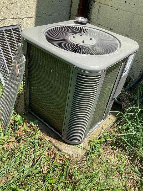 Completed spring preventative maintenance on commercial HVAC system consisting of ground-level condenser units and rooftop package unit. Performed comprehensive inspection of all equipment, including visual assessment of condenser coils, fan operation, refrigerant line sets, and electrical disconnects. All units found to be in operational condition with no immediate service needs identified. Documented equipment condition through photographic records for maintenance file.