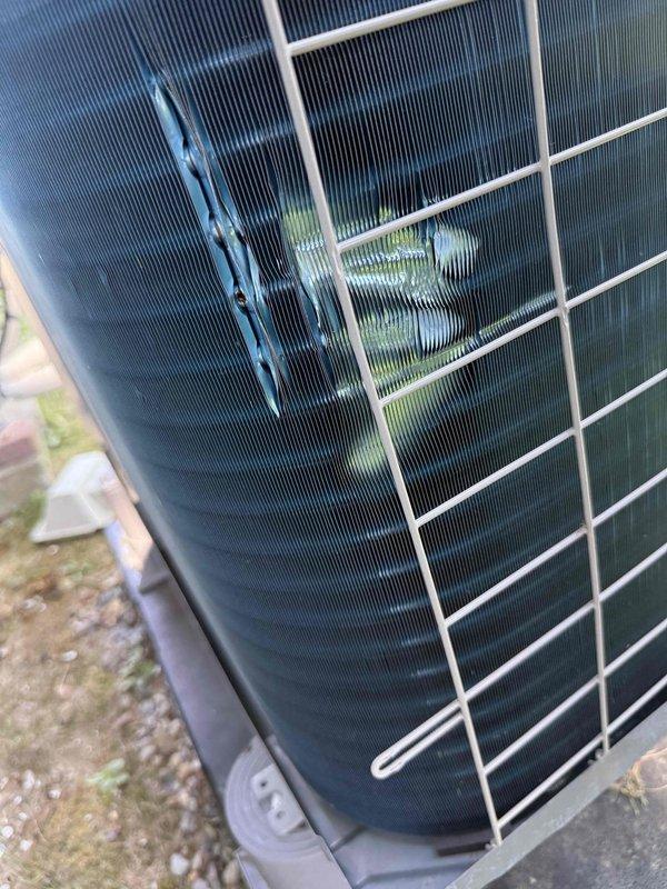 Responded to service call for mini split system displaying low refrigerant error code. Upon arrival, connected manifold gauges to service ports and verified refrigerant charge levels were below manufacturer specifications. Inspected outdoor condenser unit coil and protective grille for damage or blockages, finding fins in acceptable condition. Removed access panel from indoor unit to check for potential leak points and system integrity. System requires refrigerant recharge and leak detection testing to restore proper operation and resolve error code condition.