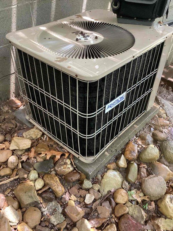 Completed comprehensive air conditioning tune-up on 26-year-old system. Performed inspection of indoor air handler unit located in attic space, checking electrical connections, condensate drainage, and airflow components. Inspected outdoor condenser unit, including fan motor assembly, refrigerant levels, and cleaned debris from base area. Utilized diagnostic equipment to verify system operation and performance parameters. Unit operational at time of service completion.