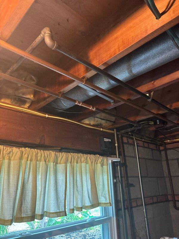 Completed full HVAC system replacement including furnace and air conditioning unit. Installed new equipment with proper ductwork connections, ensuring all components were securely mounted and integrated with existing infrastructure including copper plumbing lines and PVC drainage systems. Verified blower assembly operation, tested all electrical connections, and confirmed system functionality upon completion.