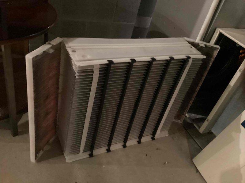Completed scheduled commercial cooling maintenance visit. Inspected outdoor condenser unit and indoor evaporator coil assembly. Documented current condition of equipment with exterior condenser showing normal operation and indoor coil exhibiting dust accumulation requiring attention during routine maintenance protocol.