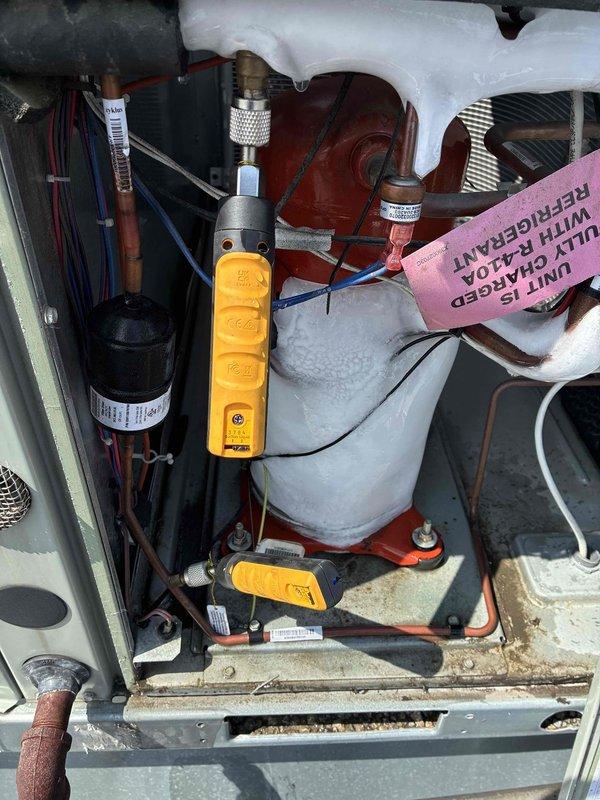 Responded to no cooling complaint on 5-year-old commercial unit. Upon arrival, found evaporator coil heavily frosted due to severely restricted airflow from never having filter changed. Documented frosted suction line and low superheat conditions with diagnostic equipment. Removed and replaced extremely dirty air filter that was completely clogged with debris. Allowed system to defrost, verified proper airflow restoration, and confirmed unit returned to normal cooling operation. Advised customer on importance of regular filter maintenance to prevent future issues.