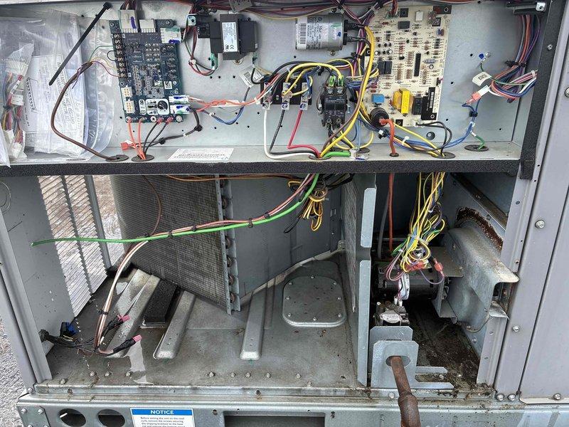 Performed preventative maintenance on commercial air conditioning unit including thorough cleaning and operational inspection. Utilized Fieldpiece SC440 digital multimeter to verify electrical readings and system performance parameters. Accessed control compartment to inspect electrical components, control boards, capacitors, relays, and wiring connections for proper operation. Verified refrigeration system components including evaporator coil, copper refrigeration lines, and filter drier were functioning within normal specifications.