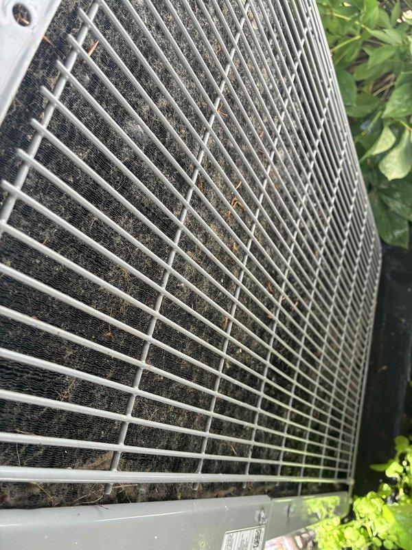 Completed annual maintenance on a 1-year-old residential air conditioning system. Performed electrical diagnostics using testing meter to verify proper voltage and amperage at the condensing unit, inspected condenser coil condition noting minor dust accumulation on fins, and confirmed all electrical connections were secure. Unit operating within normal parameters with no immediate service needs identified.