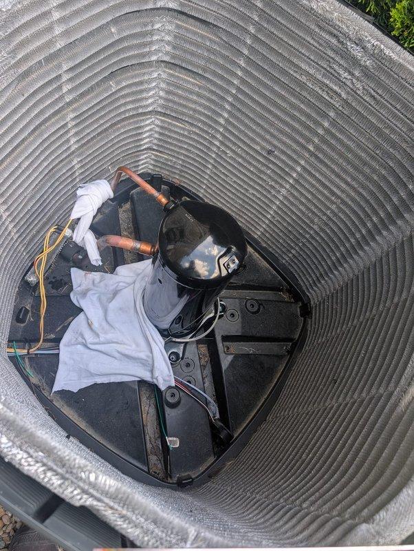 Replaced failed compressor on commercial air conditioning condenser unit under parts warranty coverage. Removed defective compressor, brazed refrigerant line connections closed to return for warranty claim, and installed new compressor with proper refrigerant line connections. System tested and operational upon completion.