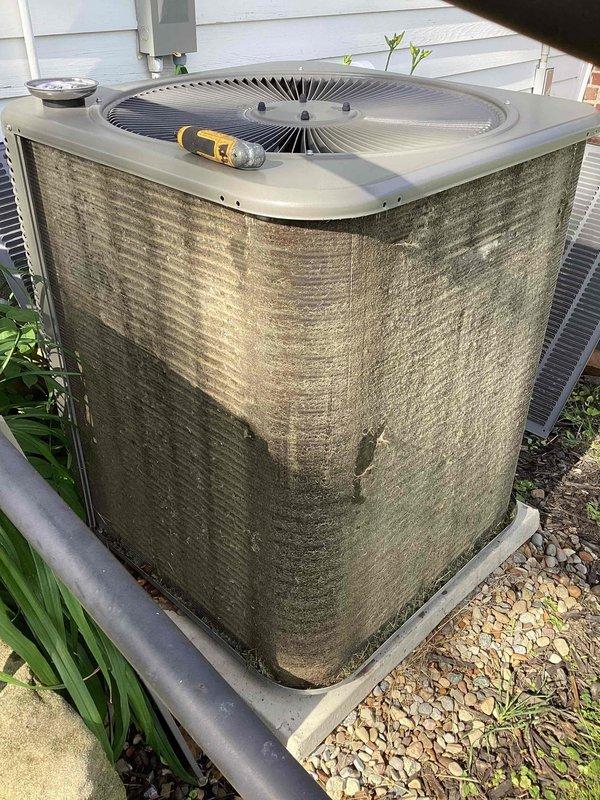 Responded to service call for commercial A/C unit overcooling space, with thermostat set to 69°F but reading 62°F. Upon arrival, confirmed unit was cooling excessively and instructed occupants to power down system to prevent further temperature drop and potential freezing of evaporator coil. Exterior condenser inspection revealed heavy accumulation of dirt, dust, and debris on cabinet panels and coil surfaces, indicating lack of regular maintenance that could contribute to system performance issues requiring further diagnostic evaluation and cleaning.