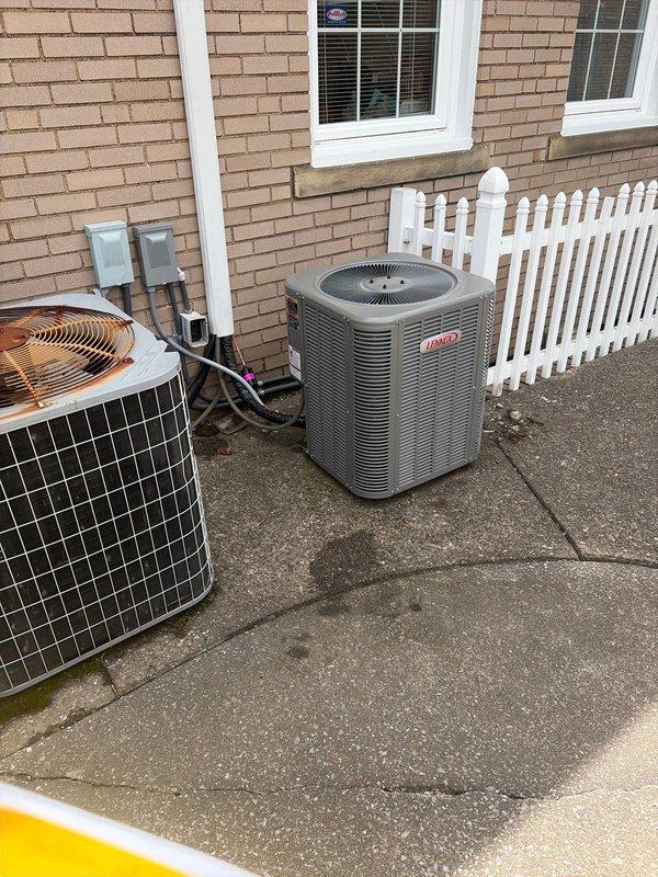 Completed commercial HVAC new construction installation including Bryant condensing unit and matching evaporator coil on prepared concrete pad. Connected refrigerant lines, established proper vacuum levels using digital manifold gauges, charged system to manufacturer specifications, verified electrical connections and conduit routing per code requirements, and conducted full operational testing to confirm proper system function.